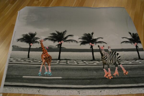 Panel med zebra og giraf på rulleskøjter